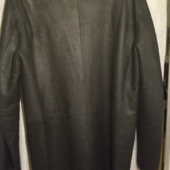 Medium DKNY 3/4 length lambskin shearling.